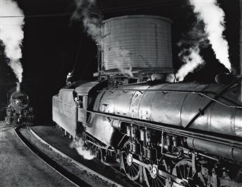 O. WINSTON LINK (1914-2001) A group of 5 photographs depicting scenes with Locomotives 104 and 563.